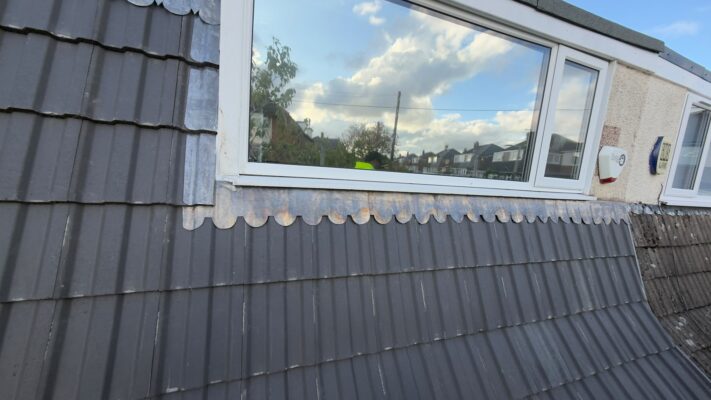 New roof tiles and lead flashing around dormer window