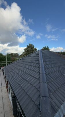 Completed grey tiled roof replacement in Stockport