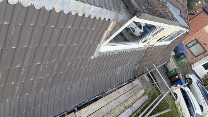 New roof tiles and flashing around dormer roof